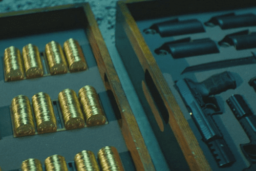 “John Wick 1” film (2014), scene at 0:26 hour, secret stash with Coins and Guns