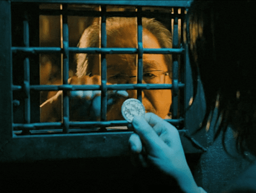 “John Wick 3” film (2019), scene at 0:09 hour, a Coin at the secret door for the private medical doctor